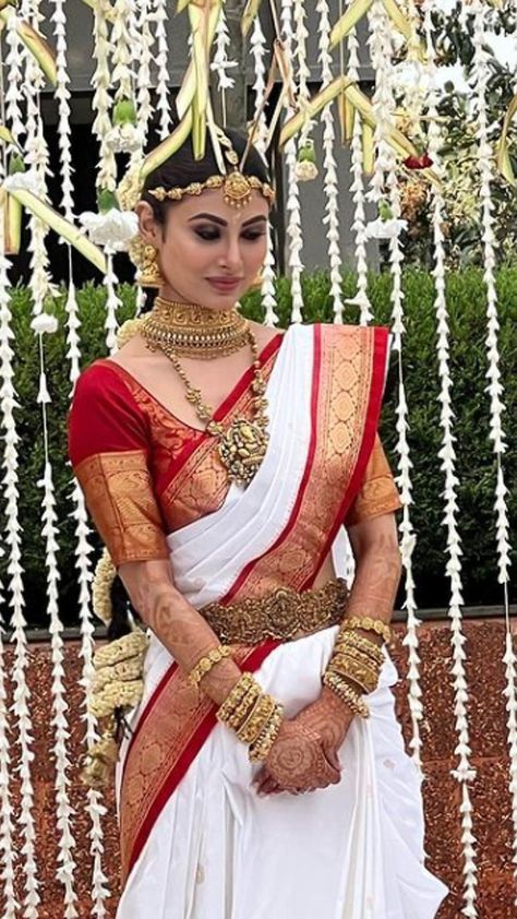 Malayalee Saree, White And Red Saree, South Bride, Red Saree Wedding, Moni Roy, Asian Inspired Wedding, Langa Voni, Saree Hairstyles, Bengali Bridal Makeup