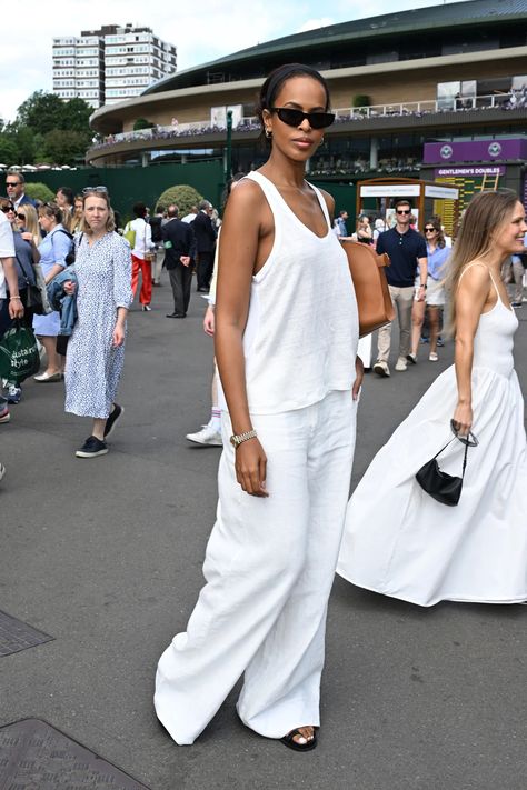 Wimbledon best dressed: Who were the most stylish society stars, tennis titans and elegant It-girls at this year’s event? | Tatler Wimbledon Style, Best Celebrity Outfits, Wimbledon Fashion, Tennis Tournament, Cream Trousers, Tennis Championships, Floral Slip Dress, Tennis Match, Fashion Moments