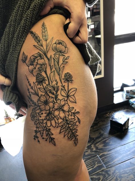 Boho Hip Tattoos Women, Side Thigh Cover Up Tattoos Women, Womens Plant Tattoos, Side And Hip Tattoos, If You Go Down Im Going Down Too Tattoo, Wild Flower Tattoo Thigh, Hip Tattoo Inspiration, Thigh Garden Tattoo, Hip Tattoo Wildflower