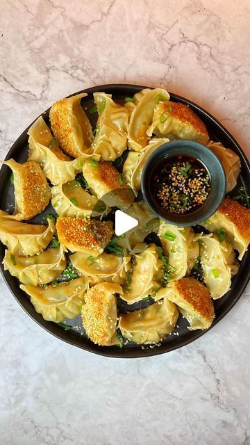 Joely Hiles👩🏽‍🍳 on Instagram: "A DUMPLING LOVER ‘TIL I DIE🥟 Prawn gyozas, makes 25: 3 pack Choi leaves, 1 carrot, 5 spring onions, large thumb of grated ginger, 3 garlic cloves, 350g prawns, 2 tbsp soy sauce, 1 tbsp mirin, 1 tsp fish sauce, 1 tsp shichimi, 1 tsp honey, 1 tsp sesame oil, 25 gyoza skins, 2 tbsp sesame seeds and 1 tsp veg oil for frying! #gyoza #gyozas #dumplings #dumpling #asmr #asianfood #healthyfood" Spring Onions, Spring Onion, Fish Sauce, Sesame Oil, Sesame Seeds, Minced Garlic, Dumplings, Japanese Food, Soy Sauce