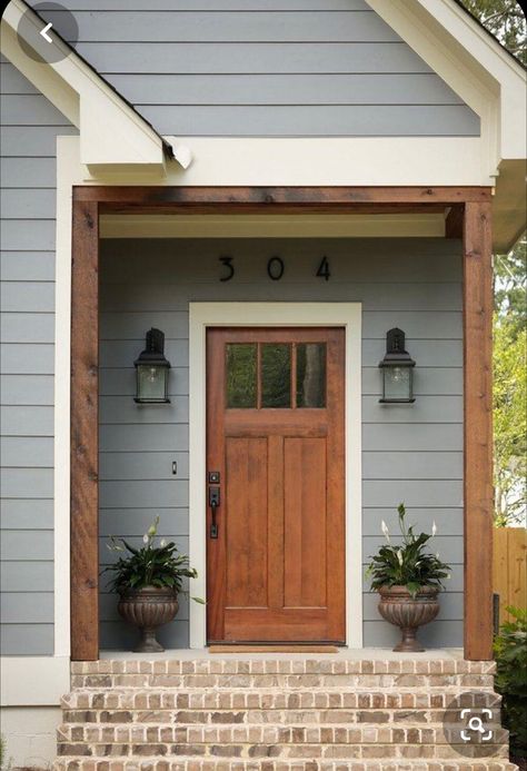 Craftsman House Front Porch, Stucco Craftsman Exterior Colors, House Colors Outside Paint, Craftsman Style Door Exterior, Front House Remodel Exterior Makeover, Cedar Shutters On Gray House, Front House Wood Accents, Grey House Door Color Ideas Exterior, Craftsman Entryway Exterior