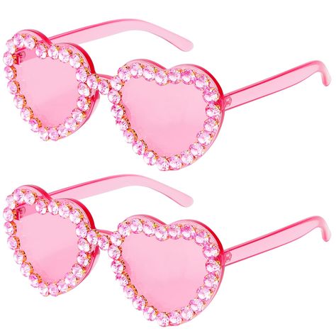 PRICES MAY VARY. ❤ HIGH QUALITY MATERIAL：The plastic sunglasses are made of high-quality plastic, alloy and rhinestone materials, not easy to break, the legs of glasses are tightly connected, not easy to loose, and the integrated nose pad design is comfortable to wear and can be used for a long time. ❤ STYLISH DESIGN：The rimless sunglasses are stylish and modern in design，with large frames that suitable for any face shapes. Rhinestone frames highlight your unique taste, making you more dazzling Black Heart Sunglasses, Red Heart Glasses, Red Heart Sunglasses, Sunglasses Colorful, Transparent Heart, Heart Glasses, Rhinestone Material, Red Sunglasses, Shaped Sunglasses