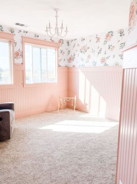 Girl's Nursery Makeover Pt.1Pink Bead Board I've done my fair share of board/batten projects with my husband, Scott, by now but we have yet to work with beadboard and I really wanted this room to feel very feminine and feel like a room you would see in a victorian/craftsman home 100 years ago (but a little more modern). We just finished up a boy's room makeover for our son's who are now sharing a room, this was our youngest sons nursery, and that room has a dark green board/batten t… Board And Batten Nursery With Wallpaper, Light Pink Board And Batten, Girls Bedroom Board And Batten, Bead Board In Nursery, Wallpaper And Beadboard Nursery, Beadboard Girls Bedroom, Kids Room Beadboard, Wainscoting Girls Bedroom, Board And Batten Wall Girls Room