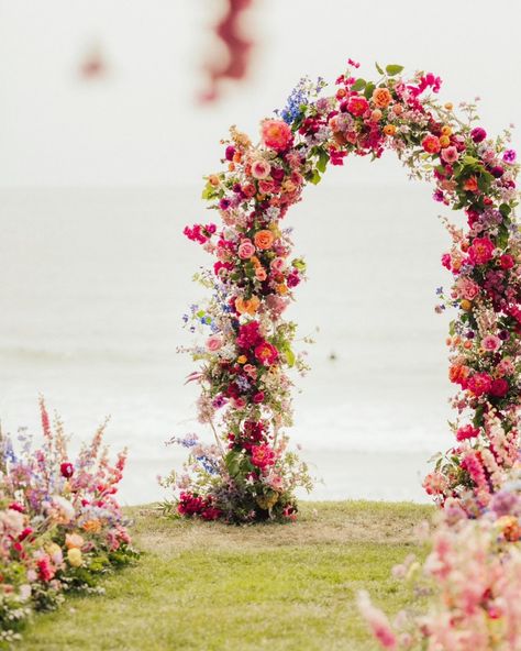 September Wedding Arch, Wedding Arch Colorful, Colorful Wedding Ceremony, Colourful Weddings, Pastel Wedding Decorations, Flower Arches, Wedding Planning Boards, Wildflower Wedding Theme, Cottagecore Wedding