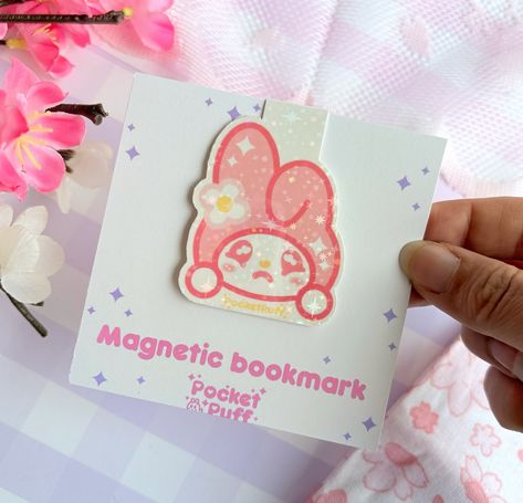 🎀magnetic bookmarks!🎀 find them on my etsy ✨✨ cinnamoroll, my melody, and kuromi! which one is your favourite? tags: #bookstagram #bookmarks #cutebookmark #cutebookmarks #bookmark #magneticbookmarks #magneticbookmark #mymelody #cinnamoroll #kuromi #cutebooks #cutebook #bookaccessories #bookstuff #kawaiibookmark #sanrioart #sanriofanart #sanriocore #sanriocharacters #sanrioaesthetic #cuteshop #kawaiishop Cute My Melody, My Melody And Kuromi, Melody And Kuromi, Cinnamoroll Kuromi, Cute Bookmarks, Magnetic Bookmarks, Kawaii Shop, Sanrio Characters, My Melody