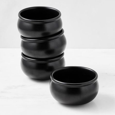 The ultimate way to enjoy witch's brew, eye-of-newt soup and other spooky recipes, our cauldron bowls are conjured by hand from stoneware with a matte black glaze. Perfect for Halloween or any time of year when putting a spell on guests is required. Made from durable stoneware. Finished with matte black glaze. Microwavable and dishwasher safe. Set of four. Halloween Dinnerware, Entertaining Table Settings, Tyler Florence, Spooky Food, The Black Cauldron, Table Setting Inspiration, Witch's Brew, Black Glaze, Soup Bowls