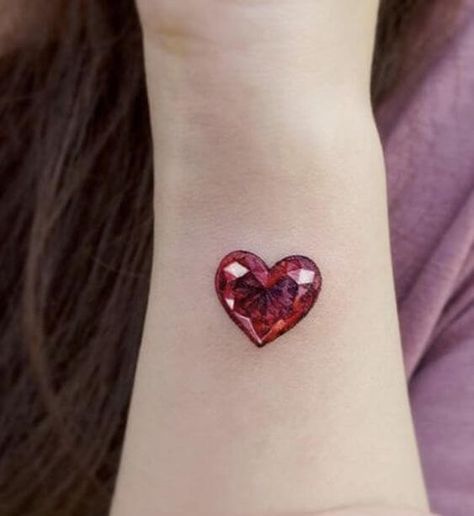 35 HEART TATTOOS FOR LOVERS AROUND THE WORLD - 218 Ruby Heart Tattoo, Ruby Tattoo Ideas, Ruby Tattoo, Gem Tattoo, Jewel Tattoo, Food Tattoos, Diamond Tattoos, Heart Tattoos, Tattoos For Lovers