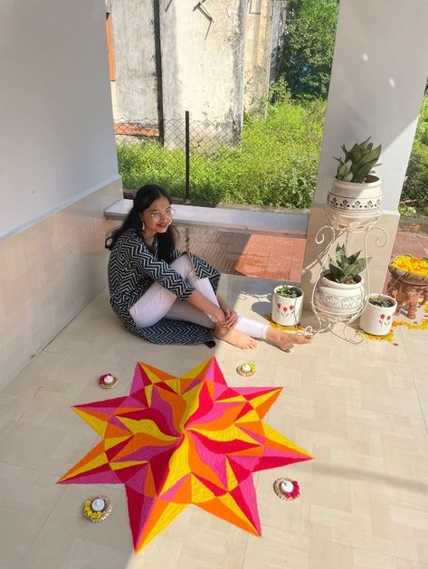 Pink red orange yellow rangoli in a circle gemoetrical pattern Rangoli With 3 Colours, Diwali Rangoli Circle, Geometric Rangoli Designs, Circle Rangoli Designs Diwali, Rangoli Circle, Yellow Rangoli, Circle Rangoli Design, Geometric Rangoli, Circle Rangoli