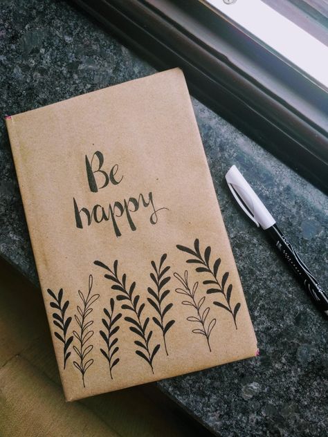 Happiness message and simple black pen art on brown paper diary Brown Book Cover Design, Black Pen Art Doodles Easy, Simple Black Pen Drawing, Simple Diary Design, Drawing On Brown Paper Ideas, Drawing On Brown Paper Simple, Brown Notebook Cover Design, White Pen Art On Black Paper Easy, Easy Black Pen Drawing