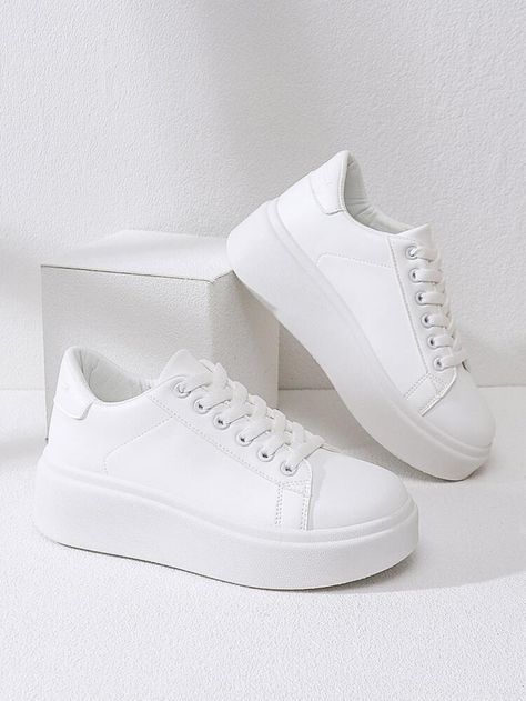 White slip on sneakers