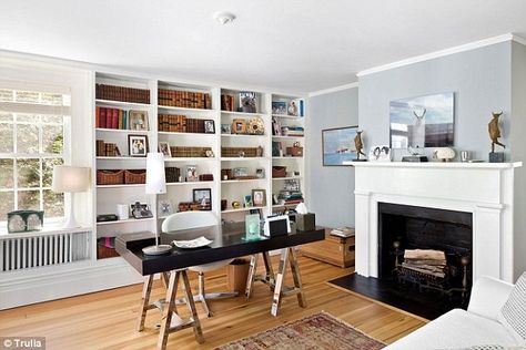 Stunning: Hardwood floors give the historic home a modern touch ... Home Office With Fireplace, Office With Fireplace, Fireplaces Layout, Cheap Office Furniture, Vintage Home Office, Stylish Desk, Home Office Ideas, Hamptons House, Small Home Office