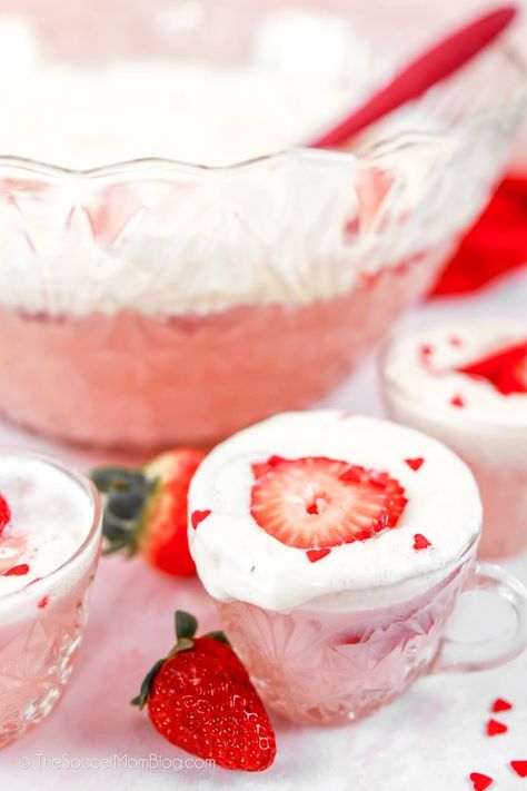 Cupid's Valentine Punch is a festive holiday punch perfect for Valentine's Day parties. Directions for both a boozy version and non-alcoholic punch are included! Strawberry Ice Cream Punch Recipes, Valentine’s Day Punch Alcoholic, Strawberry Ice Cream Punch, Valentines Punch Alcohol, Valentine’s Day Punch, Valentine Punch Recipe, Valentines Day Punch, Valentines Punch, Valentine Punch