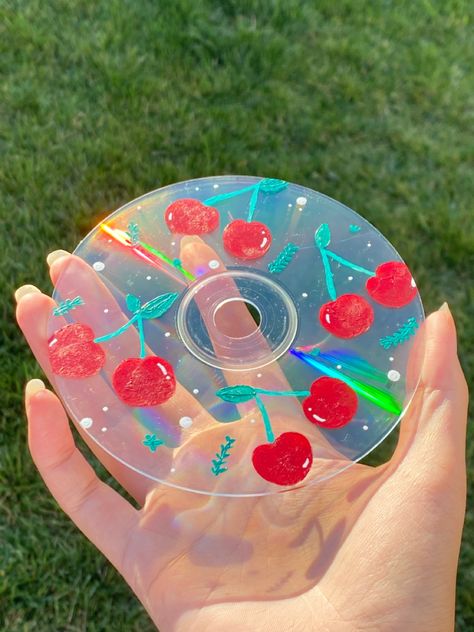 Cherry painted clear cd Painting Cds, Cd Idea, Cd Wall Art, Record Wall Art, Vinyl Art Paint, Cd Wall, Diy Easter Gifts, Cd Crafts, Vinyl Record Art