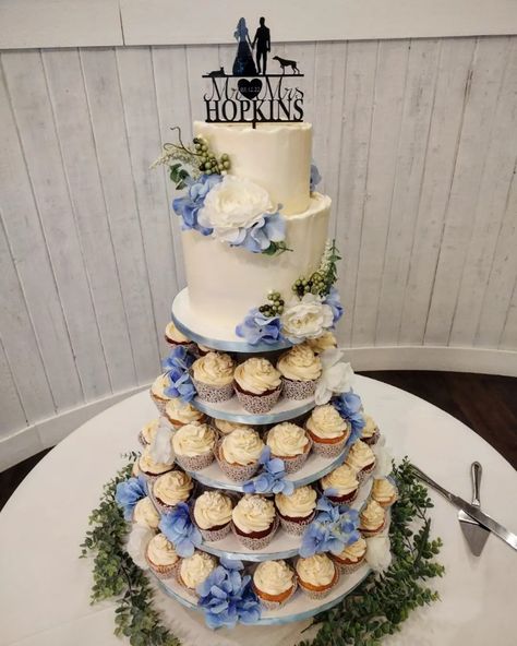 Beautiful 2 tier buttercream wedding cake with cupcake tower Dusty Blue Wedding Cake With Cupcakes, Wedding Cake With Cupcake Tiers, Blue Two Tier Wedding Cake, Cupcake Tower Wedding Rustic, Blue Wedding Cupcake Tower, Zoe Cake, Wedding Cupcake Tower, Cake With Cupcakes, Cupcake Tier