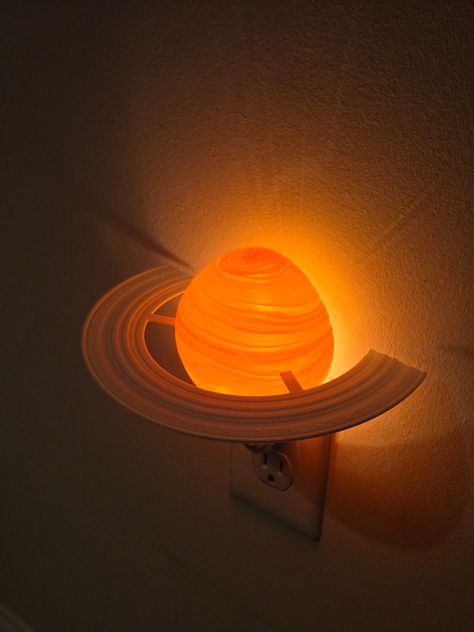 An Adorable little nightlight That's perfect for the nursery or bedroom for any future astronaut Night Light is switch activated, comes with the night light, planet bulb cover, and one bulb Outlet Night Light, Light Science Project, Alien Home Decor, Cool Night Lights, Weird Bedroom Decor, Space Themed Decor, Cool Room Stuff, Space Room Aesthetic, Space Decor Bedroom