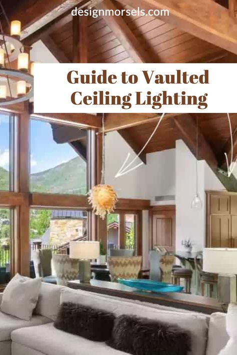 vaulted ceiling living room with text overlay guide to vaulted ceiling lighting Partially Vaulted Ceiling Living Room, Lighting With Vaulted Ceilings, Lighting For High Ceilings Open Concept, Pendant Lighting For Vaulted Ceilings, Lighting For Tall Ceilings Living Rooms, Pendant Lighting Vaulted Ceiling, High Ceiling Lamps Living Rooms, Chalet Lighting Ideas, Living Room Lighting Vaulted Ceiling