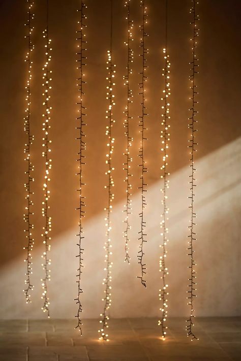 Stargazer Twinkling Tree Cascade Lights | Anthropologie Curtain Lighting, Twinkle Lights Decor, Podcast Background, String Lights Bedroom, Twinkling Tree, Fairy Lights In Trees, Basement Room, Cascade Lights, Cozy Lighting