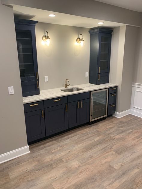 Navy Wet Bar Cabinets, Kitchen Cabinets In Basement, Navy Blue Basement Bar, Blue Cabinet Wet Bar, Blue Cabinet Bar, Navy Blue Cabinets Wet Bar, Navy Blue Bar Cabinets, Basement Remodel Wet Bar, Blue Cabinets Bar