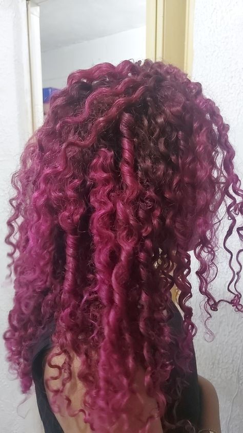 Fuschia Hair Black Women, Purplish Pink Hair, Curly Hair Vivid Color, Dark Pink Curly Hair, Dyed Curly Hair Black Women, Cherry Curly Hair, Magenta Curly Hair, Hot Pink Curly Hair, Long Dyed Hair