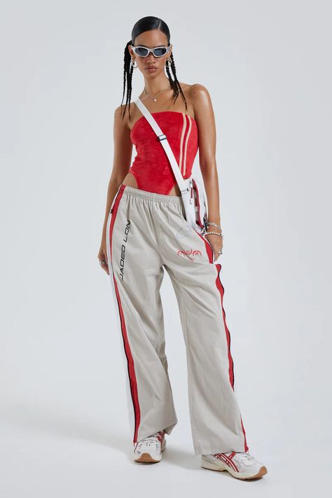 Windbreaker Pants Outfit, Red Streetwear Outfit, Track Pants Outfit, Windbreaker Pants, Rave Girl, Mesh Long Sleeve Top, Jaded London, Painted Denim, Fire Fits