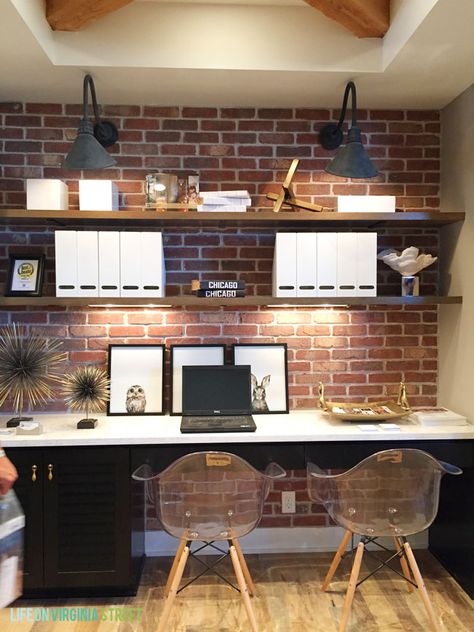 Omaha Street of Dreams Upstairs Desk Area - Life On Virginia Street Office Angled Ceiling, Office Ideas With Brick Wall, Office Room Lighting Ideas, Brick Wall Home Office, Brick Wall Office Design, Brick Accent Wall Office, Office With Brick Wall, Office Brick Wall, Office Wall Lighting