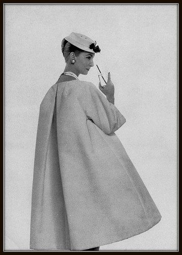 Model in (YSL) Dior's Trapeze Line coat of white cotton piqué, collarless with large inverted pleat in back, photo by Georges Saad, 1958 | Flickr - Photo Sharing! Anne Gunning, Henry Clarke, Vintage Balenciaga, Cristobal Balenciaga, 50's Fashion, Dior Collection, Simply Fashion, Cristóbal Balenciaga, Glamour Magazine