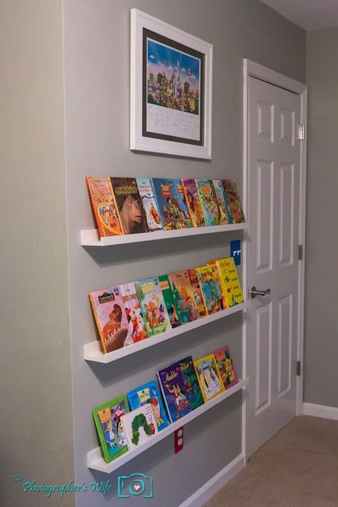 Chic Ikea picture ledges for childrenu0027s front facing book shelves. Such a nice wall bookshelves for kids Hidden Bookshelf Door, Ikea Picture Ledge, Kids Room Bookshelves, Picture Ledges, Bookshelf Door, Ikea Kids Room, Ideas Habitaciones, Nursery Book, Ikea Bookshelves