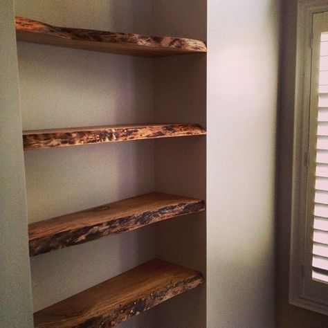 Live Wood Edge Shelves, Live Edge Wood On Walls, Reclaimed Wood Shelves Living Room, Raw Wood Floating Shelves, Rough Edge Wood Shelves, Live Edge Wood Floating Shelves, Live Edge Bookshelf Built Ins, Live Edge Shelves Bedroom, Raw Edge Shelf