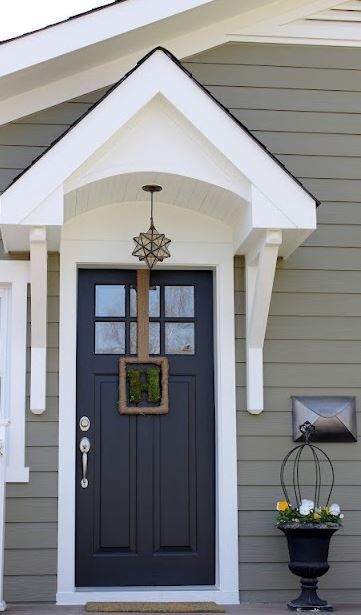 Fabulous Front Door Paint Ideas | Hirshfield's Storm Cloud Gray Benjamin Moore Exterior, Sw Connected Gray Exterior, Grey House Navy Door, Exterior Paint With Stone, Gray Houses, Navy House, Gray Siding, Pinterest House, Pintu Interior