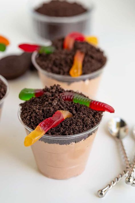 Dirt Cake Cups - These Dirt Cake Cups are the perfect spring dessert for kids! Each dirt cup has a layer of chocolate pudding mousse, crushed Oreos, and delicious gummy worms. The best part is that they're individual serving pudding cups, so no scooping and plating is required! #cookiedoughandovenmitt Dirt Pie With Worms, Dirt Cake Cups Individual, Individual Dirt Cake Cups, Dirt Cake Cups, Dirt Cups Dessert, Dirt Cups Recipe, Desserts For Christmas, Dirt Pie, Chocolate Dirt