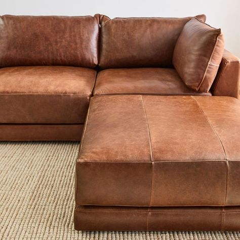 Melbourne Leather 3-Piece Ottoman Sectional (116"–126") | West Elm West Elm Leather Sectional, Leather Modular Sofa Living Room, Leather Sectional Living Room Cozy, West Elm Leather Couch, Oversized Leather Sectional, Leather Sofa With Ottoman, Leather Modular Sectional, Modern Organic Leather Couch, Tan Leather Sectional Living Room