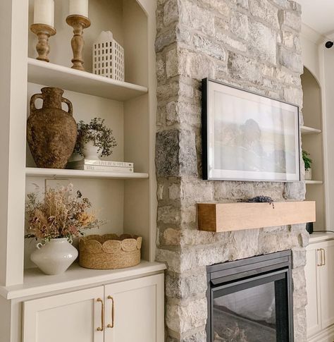 Brittany Christina | Fallin’ in love with this view over and over again 🍂 SO happy we decided to make these built ins and add a propane fireplace ! Cooler… | Instagram Stone Veneer Fireplace, Built In Around Fireplace, Propane Fireplace, Fireplace Built Ins, H&m Home, Stone Veneer, Fireplace Wall, Happy We, Neutral Decor