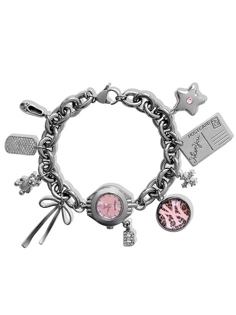 Sweet as can be ౨ৎ Introducing the 'ON THE WAY' charm bracelet - featuring the most precious pendants paired alongside a soft pink watch face, this accessory is bound to become a treasured piece in your jewelry collection. Trust us, compliments are waiting... ♡ Made with stainless steel chain, cubic zirconia and stainless steel pendants. ♡ Battery powered watch face (battery included). ♡ Included charms: Ballet slipper, CZ tag, teddy bear, ribbon bow, custom CZ letter, custom photo charm, CZ cro Vinnie Westwood Bracelet, Bow Jewelry Aesthetic, Pink Watch Face, Star Locket, Charm Bracelet Watch, Custom Charm Bracelet, Pink Watch, Jewelry Accessories Ideas, Custom Charms