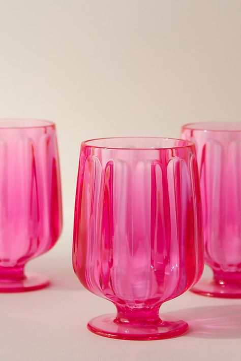 Discover the entire [Outdoor Dining & Dinnerware Collection](https://www.anthropologie.com/outdoor-entertainment).Perfect for patio and pool, these glasses are made of a durable acrylic for worry-free use indoors and outdoors. Pink Kitchenware, Cute Glassware, Orange And Pink Apartment, Dishware Aesthetic, Funky Glassware, Anthropologie Wine Glasses, College Houses, Wine Glasses Anthropologie, Fun Cocktail Glassware