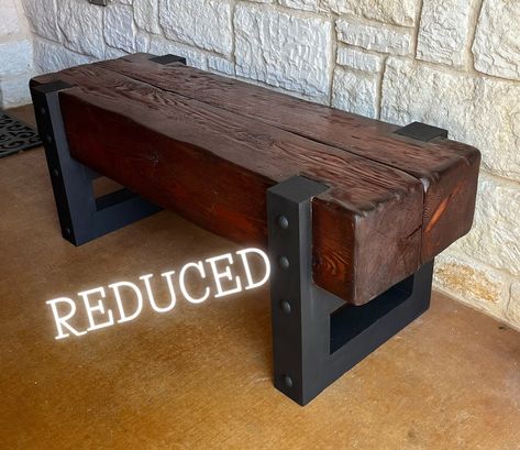 Hand Hewn Bench with a contemporay appeal. Made from solid douglas fir beams. Beams are 8" x 8" x 46.5" Stained with a Honey color Varathane stain and sealed with Varathane oil based clear coat. The legs are wood and painted flat black with metal grommets to give the legs a metal and contemporary look.  ... Free shipping still applies (Local only) Welding Furniture Projects, Douglas Fir Beams, Varathane Stain, Rustic Industrial Furniture, Rustic Wooden Coffee Table, Live Edge Bench, Entryway Hall, Diy Furniture Videos, Diy Bench Outdoor