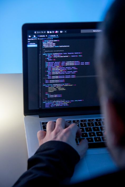 Programmer working on laptop computer in office studio. Download it for free at freepik.com! #Freepik #photo #computer #office #laptop #web Working On Laptop, A Man, Laptop, Computer, Screen