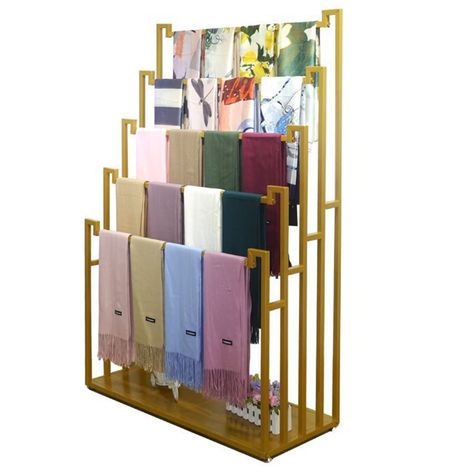 Scarf Store Design Ideas, Cloth Display Rack, Soccer Scarf Display, Displaying Belts, Display Stand Design Ideas, Scarf Display Ideas, Belt Display Retail, Blanket Display Ideas, Scarves Display