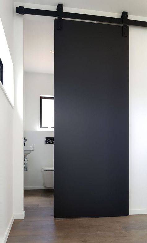 Barn Door Track Commercial Barn Doors, Modern Barn Door Bedroom, Industrial Doors Interior, Black Barn Doors In The House, Modern Barn Doors In The House, Sliding Barn Doors In The House, Slide Doors Ideas, Bathroom Sliding Door Ideas, Modern Sliding Doors Interior