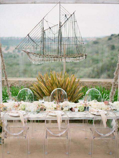 Love the ship chandelier that hung above the head table from this Shipwrecked Winter Beach Wedding Wedding Reception Head Table, Reception Head Table, Hanging Centerpiece, Backyard Canopy, Wedding Chandelier, Winter Beach, Green Beach, Nautical Wedding, A Ship