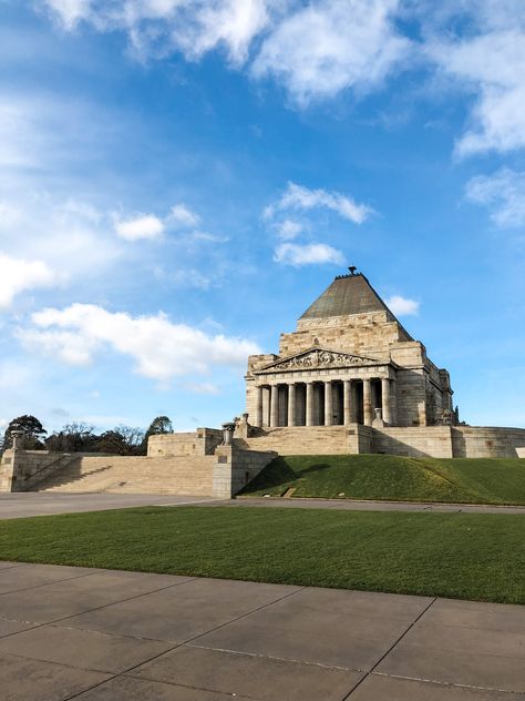 Shrine of remembrance memorial building towering over the green grass below in the sun Melbourne Australia City, Melbourne Australia, Melbourne, Australia, How To Plan, House Styles, Building