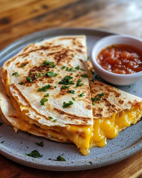 This breakfast quesadilla is a hit every morning! Everyone loves digging into this cheesy delight.   Ingredients: - 2 flour tortillas - 1 cup shredded cheese (like cheddar or Monterey Jack) - Salsa  For the rest of the ingredients and details, Link in first comment [👇] [👇]  This is the perfect way to start your day. Enjoy your cheesy morning surprise!   #BreakfastQuesadilla #CheesyDelight #MorningFuel #QuickBreakfast #TastyEats Cheesy Egg Quesadilla, Cheese Quesadilla Aesthetic, Quesadilla Pictures, Quesadilla Aesthetic, Cheesy Quesadilla, Budget Dinner, Christmas Cookie Cake, Breakfast Quesadilla, Cheesy Eggs