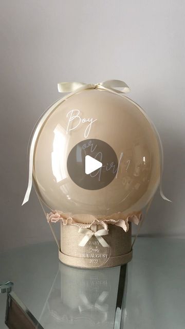 Panache Events on Instagram: "🤍gender reveal🤍 . . . This is a great way to find out if it’s a boy or girl. Pop the balloon to reveal what colour the outfit inside is. Add a personalised acrylic disc with the expected date of arrival or wording of your choice. . . . #genderrevealballoon #genderrevealideas #genderrevealparty #genderreveals #baby #mum #pregnancyannouncement #pregnant #announcement #boyorgirl #boy #girl #baby #uk #london #england #smallbusinessuk #smallbusinesses #pop #balloonsforalloccasions #surprisebox #surprise #gift #giftideas #giftbox" Pop Me Balloon Gift Ideas, I Am Pregnant Surprise, Gender Reveal Box Ideas, Ways To Reveal Baby Gender, Gender Reveal Gift Ideas, Gender Reveal Balloon Pop, Surprise Gender Reveal, Baby Announcement Gifts, Baby Arrival Announcement