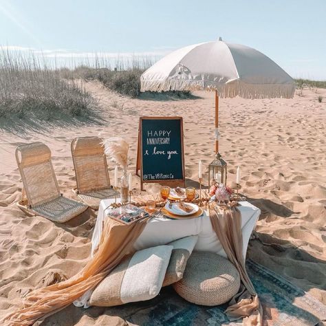 Boho chic beach picnic - proposal, anniversary idea {The VB Picnic Co.} Bohemian Beach Picnic, Boho Beach Picnic Party, Beach Party Set Up Ideas, Proposal Beach Picnic, Beach Picnic Party Table Settings, Romantic Luxury Picnic, Picnic Table Set Up, Proposal Picnic Set Up, Beach Party Set Up