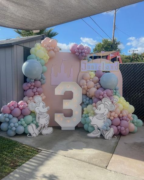 Create with Kait LLC on Instagram: "Classic Disney theme but in pastel? Sign me up please!   I am OBSESSED this design. Maybe I’m just forever meant to be Disney girl at heart, but I mean it when I say absolutely adore the disney trend. I hope it’s here to stay! 😍 the only thing this was missing was more jumbos but I forgot my bag at home 😞 💔 but still doesn’t make it oh so cute!   Thank you as always Valerie for trusting my vision for your babies 💓  Big thank you to @that_wood_be_cool for always coming through! Saved me with this signage 😍   #retrodisney #oldschooldisney #disneythemedbirthday #classicdisneybirthday #disneylandtheme #pasteldisney" Disneyland Birthday Party Backdrop, Disneyland 3rd Birthday, Vintage Disney Balloon Garland, Disneyland Birthday Backdrop, Disneyland Themed Cake, Pastel 1st Birthday Party, Disneyland Birthday Party Theme Centerpieces, Disneyland Pinata, Disneyland Backdrop Party Ideas