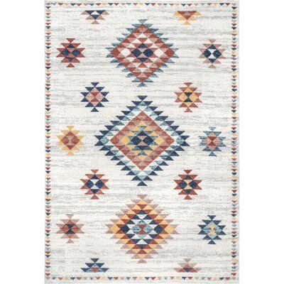 Add a pop of southwestern flair to your space with this rustic color palette and vibrant pattern. Machine-made from durable synthetic fibers, this rug has a silky texture that is durable and resists stains. Rug Size: Rectangle 5'3" x 7'6" | Union Rustic OZCE01A Area RugPolypropylene in White, Size 90.0 H x 63.0 W x 0.31 D in | Wayfair Rustic Color Palette, Nuloom Rugs, Rustic Color Palettes, Affordable Rugs, Southwestern Area Rugs, Rustic Colors, Transitional Area Rugs, Cow Hide Rug, Geometric Area Rug