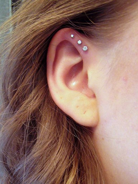 i already have one hole there....maybe i should make it 3 in a row like this? 3 Earrings Piercing In A Row, Hole Ear Piercing, 3 Ear Piercings, Triple Forward Helix, Piercing Inspiration, Ear Piercings Chart, Piercing Chart, Double Ear Piercings, Diy Easter Gifts