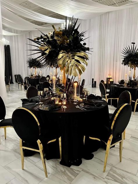 Black And Gold Banquet Ideas, Black Wedding Reception Ideas, Black And Gold Party Centerpieces For Men, Maskarade Black Party, Black Gold Silver Color Palette, Great Gatsby Table Decorations, A Night Of Elegance Party Ideas, Black And Gold Feather Centerpieces, Black Silver And Gold 70th Birthday Party Ideas