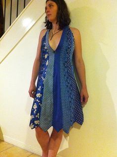 necktie dress | A decorative glass stone was added to the mi… | Flickr Tie Projects, Necktie Dress, Upcycled Neckties, Clothes Upcycle, Necktie Crafts, Old Ties, Vintage Ties, Blue Necktie, Upcycled Fabric