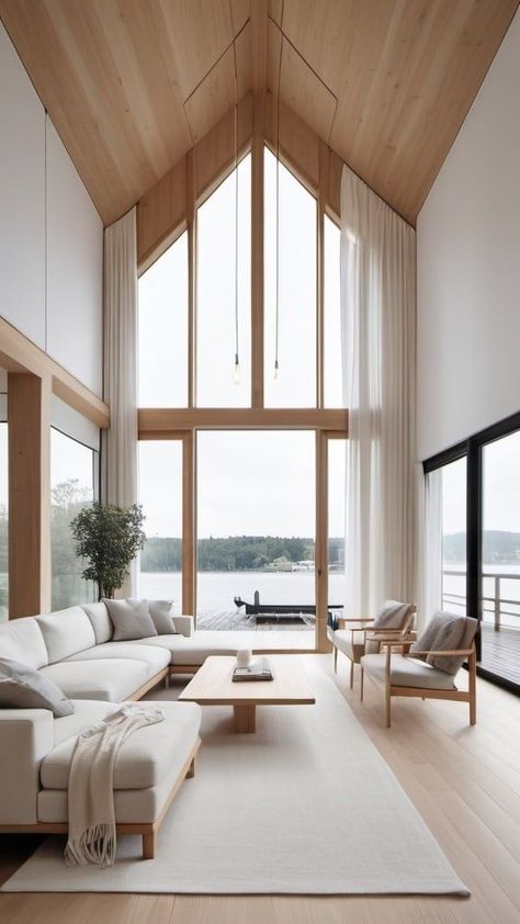 Stunning Scandinavian Living Room with Lakeside Views Light And Airy Modern Living Room, White Oak Vaulted Ceiling, Living Room Skylight Ideas, Vaulted Ceiling Curtains, Scandinavian House Design Interiors, Barndo Windows, Natural Light Interior Design, Scandinavian Sunroom, Scandinavian Living Room Nordic Style