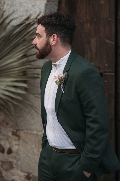 Groom in Forest Green Wedding Suit and Grandad Shirt | Two Grooms in Pink Wedding Suit and Green Wedding Suit for an Intimate Barcelona Wedding with Dried Plam Leaves Decor by La Dichosa Photography Forest Green Groom Suit, Forest Green Tuxedo Wedding, Forest Green Suit Wedding, Forest Green Groomsmen, Forest Green Wedding Suit, Forest Green Tuxedo, Forest Green Groomsmen Attire, Green Wedding Suit Groom, Forest Green And Pink Wedding